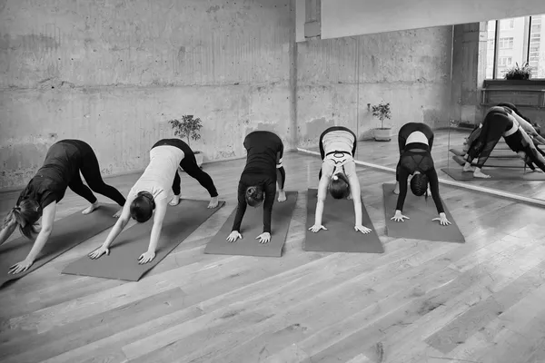 Elle teaching a yoga class